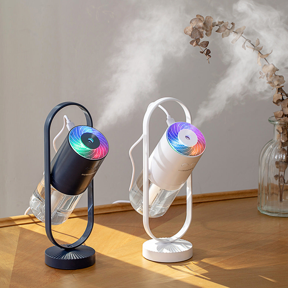Magic Shadow Projection Humidifier & Night Light or Muvixus "Magic Shadow" Desktop Humidifier.